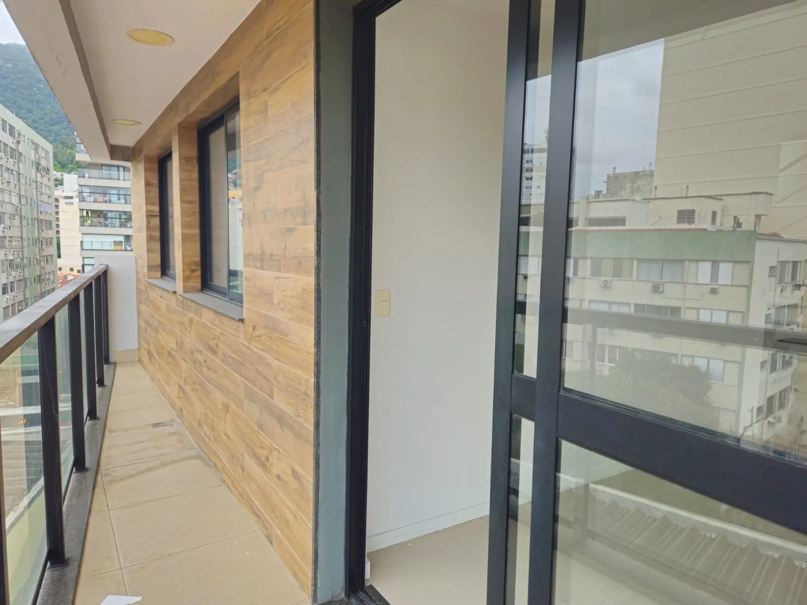 Épico Residencial — Varanda da sala