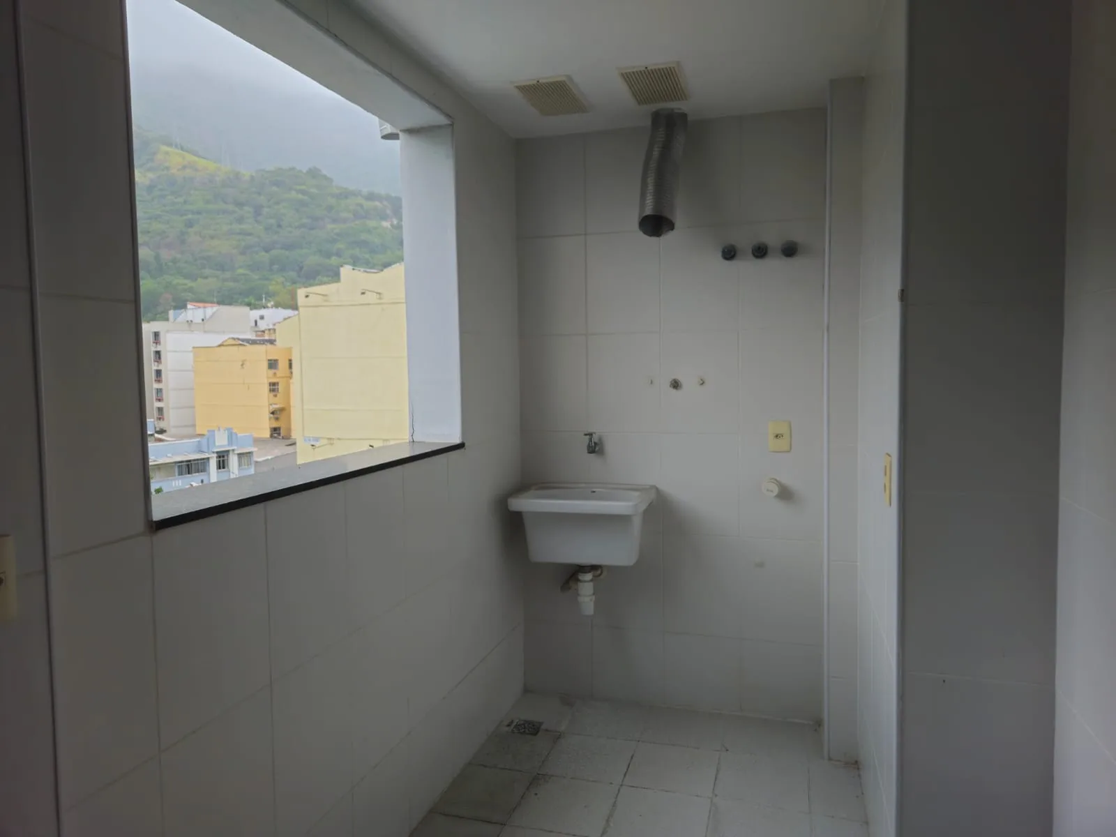 Épico Residencial — Área de Serviço